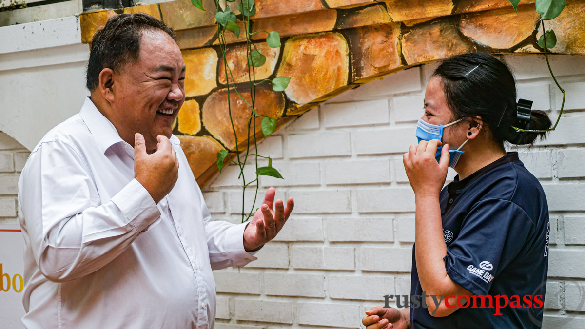 KOTO founder Jimmy Pham shares a laugh with a KOTO student